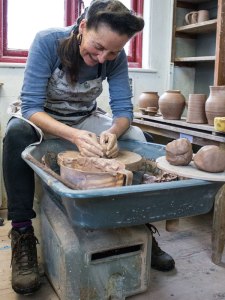 katrina-naomi-throwing-on-the-potters-wheel